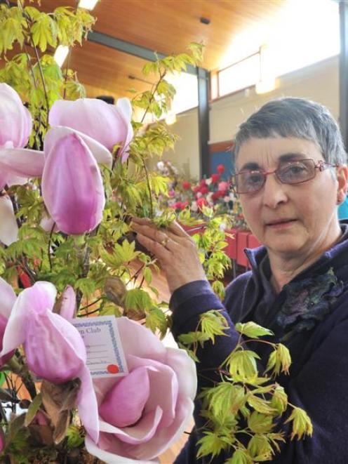 Glenys Clements with her champion exhibit Spring Awakening, at the Blueskin Garden Club Spring...