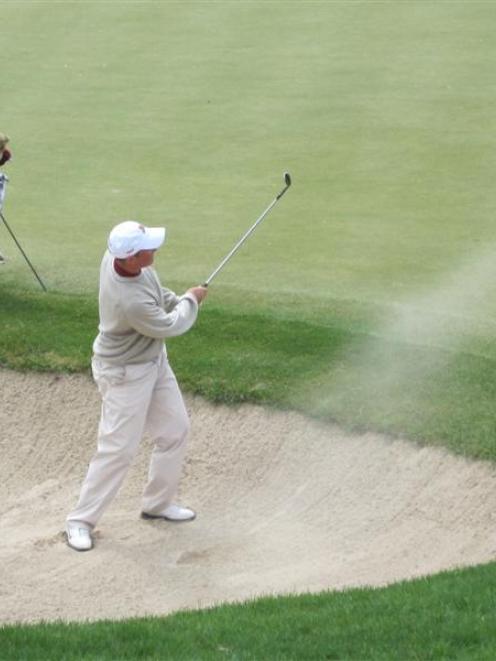 Thomas Campbell plays out of a bunker at a tournament in the United States. Photo supplied.