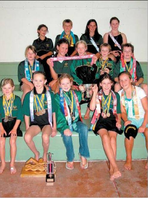 Good haul: The Alexandra Swimming Club with the spoils from the Otago championships — one of...