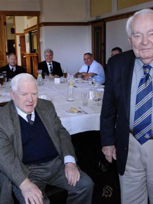 Gordon Parry (standing) celebrates his 90th with(clockwise from front left) Clarke Isaacs, Graeme...