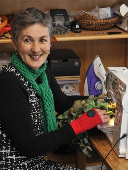 Grace Oxwell works on her latest project after finding out her World of WearableArt entry had...