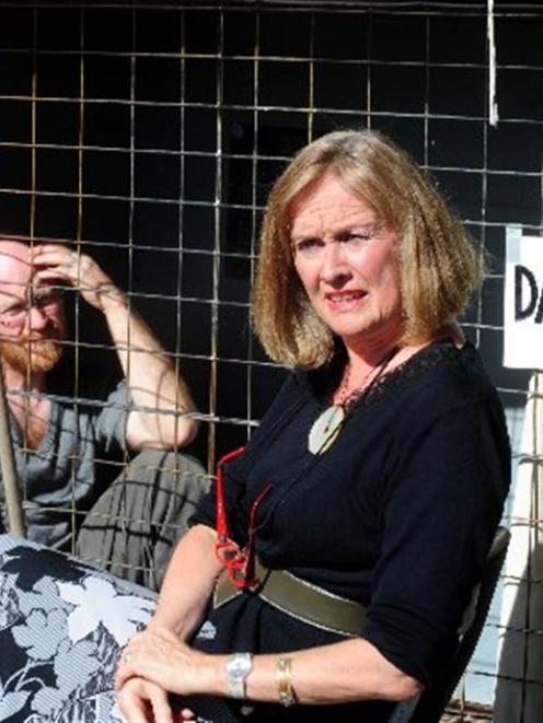 Green MP Sue Kedgley visits caged-hen protester Carl Scott, who is spending a month in a cage to...