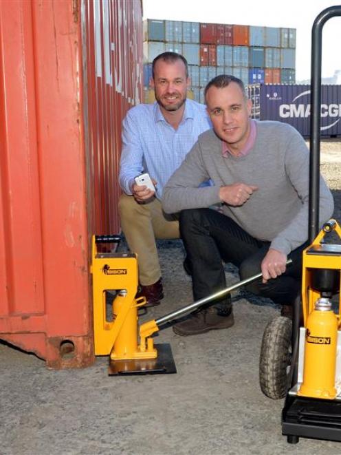 Greg (left) and Mark Fahey, from tech company Bison, with their container weighing system. Photo...