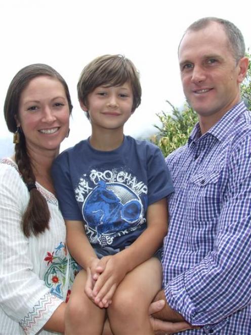 Griffin Parker (6), with his parents Monica and Matt, is excited to be one of 88 children...