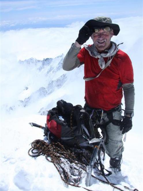 Guide Geoff Wayatt enjoys his 24th visit to the top of Aoraki Mt Cook.  Photo by Philip Somerville.