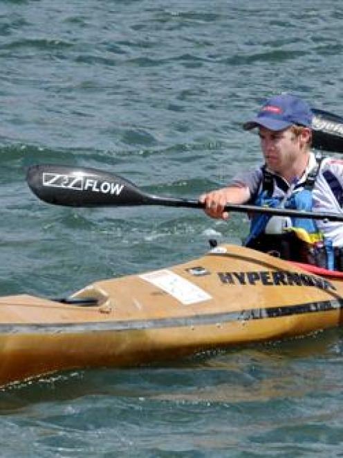Hamish Fleming (left)  and Pete Smallfield begin the kayak stage of the adventure challenge on...