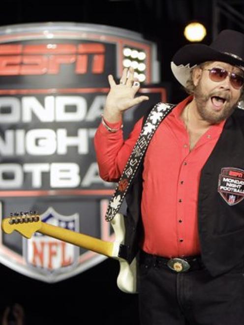 Hank Williams Jr. performs during the recording of a promo for ESPN's broadcasts of "Monday Night...