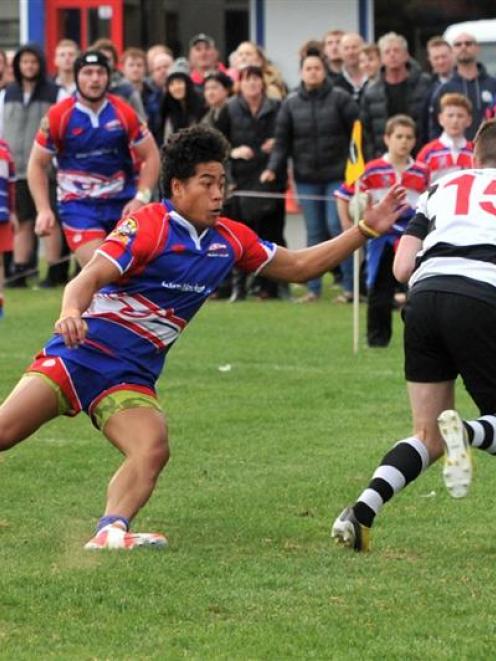 Harbour fans watch as winger Sala Halaleva (left) tries to bring down Southern fullback Bryce...