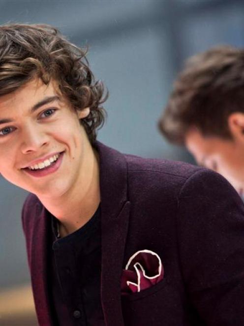 Harry Syles performs with his band "One Direction" on NBC's Today show in New York.  REUTERS...