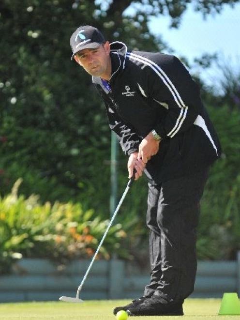 Hawkes Bay golfer Robert Robinson demonstrates his skills on the putting green at the Chisholm...
