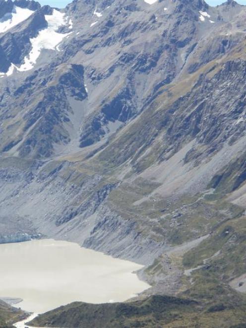 The glacial lake below the Hooker Glacier (centre left).  The glacier's retreat means the moraine...