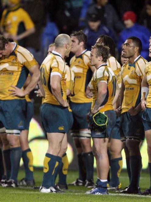 Heads go down in the Australian team as they loose against New Zealand last night. Photo by NZPA.