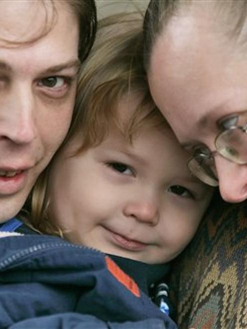 Heath Campbell, left, with his wife, Deborah, and son Adolf Hitler Campbell, 3. Photo by AP.