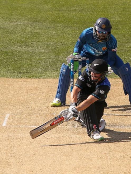 Henry Nicholls bats during a one-day international for New Zealand against Sri Lanka.