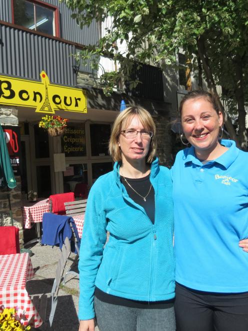 Here to stay . . . Bonjour Cafe manager Lucie David, left, and co-owner Olivia Reinhardt in the...