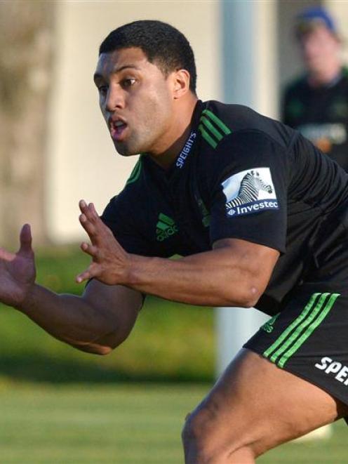 Highlanders first five-eighth Lima Sopoaga takes the ball at training at University Oval...