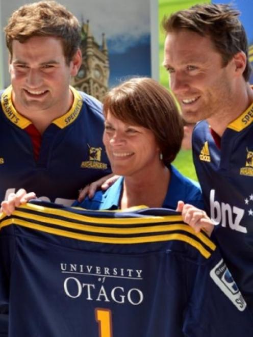 Highlanders player and University of Otago graduate Craig Millar (left) and co-captain and ...