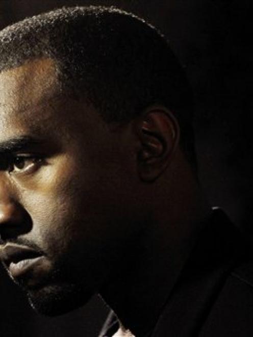 Hip-hop artist Kanye West is pictured before a screening of "Runaway," a short film he directed...