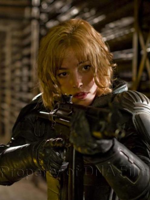 His rookie partner played by Olivia Thirlby.