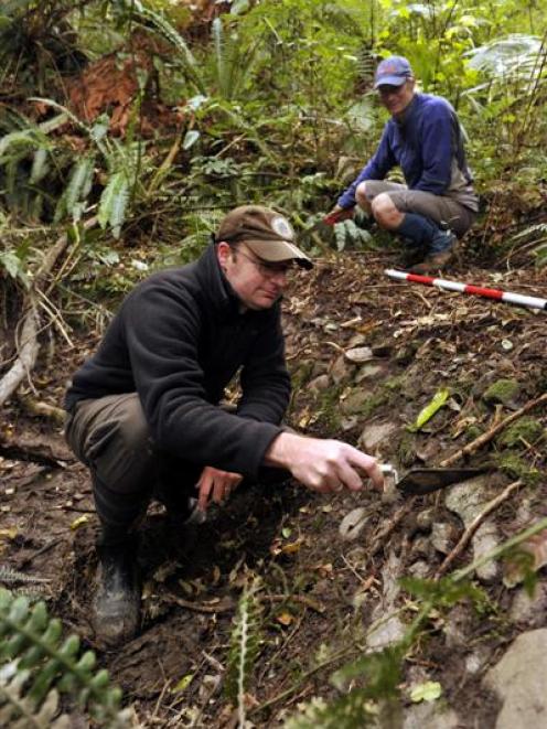 Historic Places Trust Otago-Southland regional archaeologist Matt Schmidt (front) and Mountain...