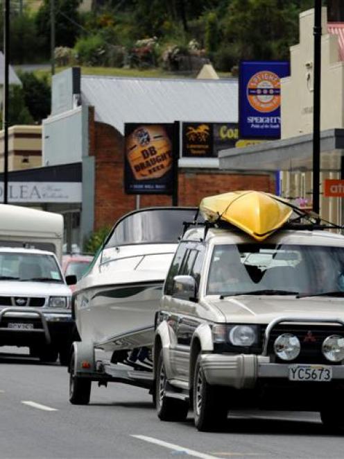 Holiday traffic heading towards Central Otago and the lakes travels through Lawrence yesterday....