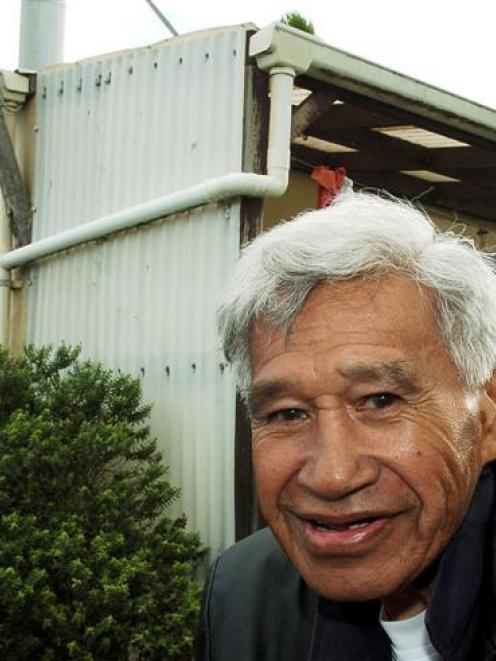 Hone Tuwhare outside his the Kaka Point home in 2004. Photo by Stephen Jaquiery.