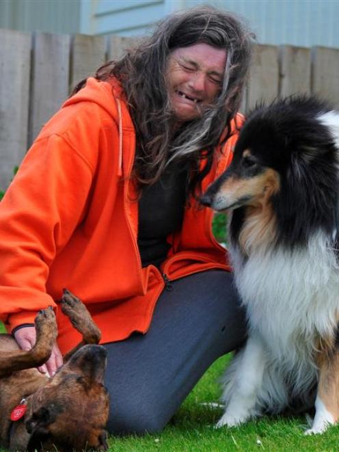Housing NZ tenant Taina Goodwillie, with her dogs Angel (left) and Bracken, in Brockville...