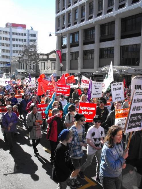 Hundreds turn out to protest against employment law changes, in a march and rally in Dunedin...