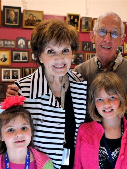 Iain and Heidi McKay look for branches of their family tree with their grandchildren Abby (left)...