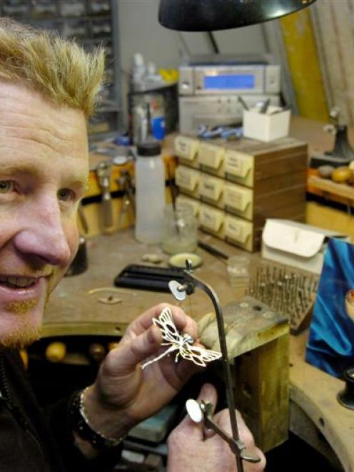 Work continues as usual for Dunedin jeweller Chris Idour, despite his selection as a finalist in...