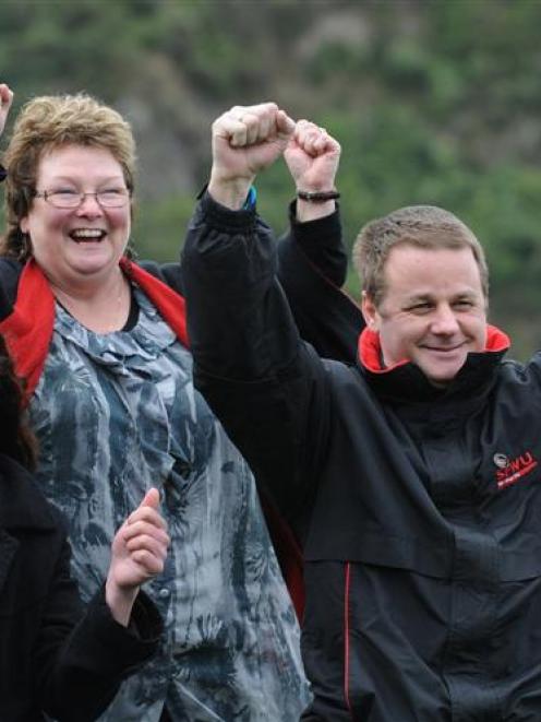 IHC Dunedin community support workers Rachael Johnson (left) and Duane Norrie celebrate the...