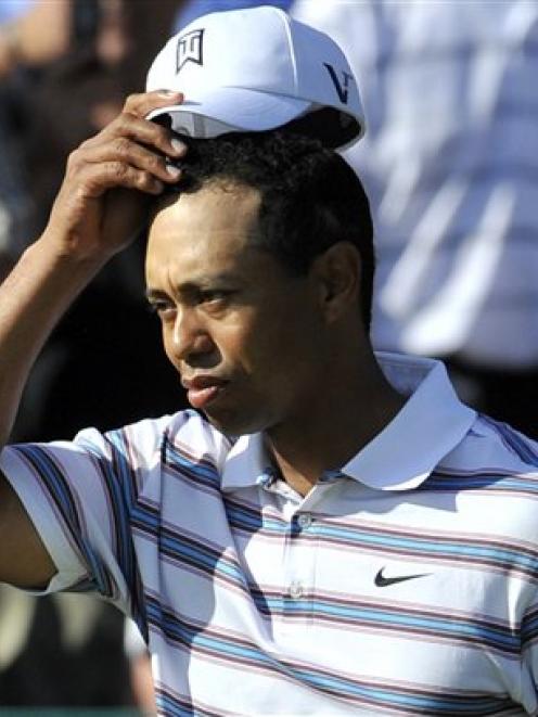 Image shattered - Tiger Woods. Photo by AP