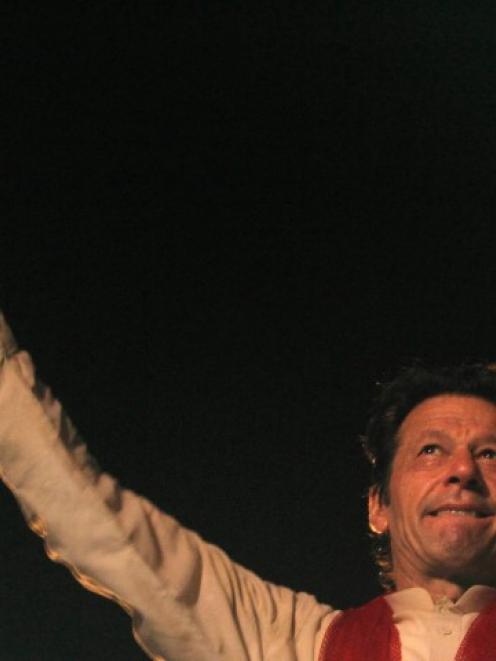 Imran Khan gestures to his supporters during a Freedom March in Islamabad. REUTERS/Faisal Mahmood