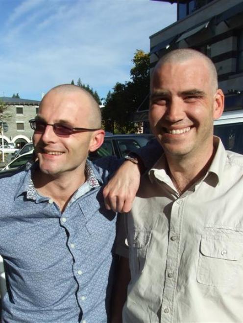 In exchange for a close shave, Jonathan Cloudesley (left) and Marty Newell,  of Radioworks...