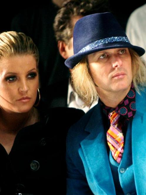 In this 2007 file photo, Lisa Marie Presley is pictured with her husband Michael Lockwood. Photo...