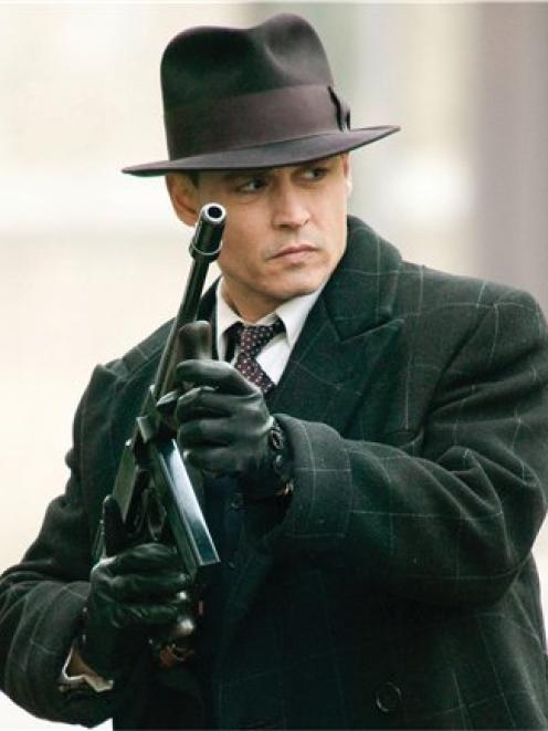 In this film publicity still released by Universal Pictures, Johnny Depp stars as legendary...