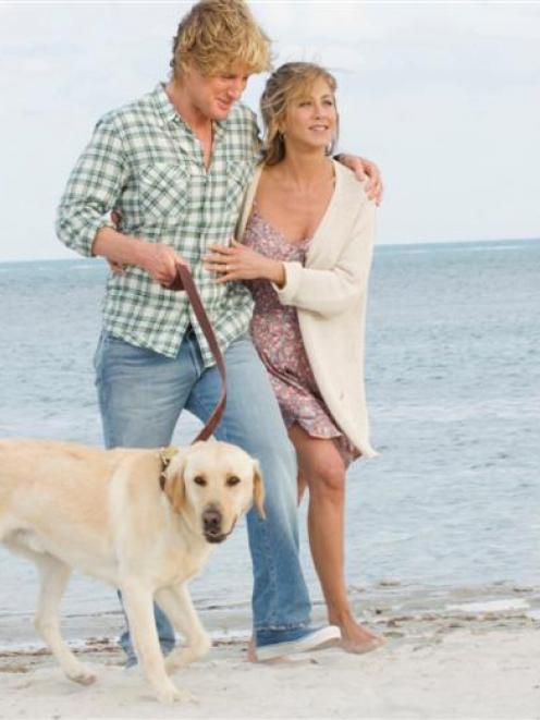 In this image released by 20th Century Fox, Owen Wilson and Jennifer Aniston are shown in a scene...