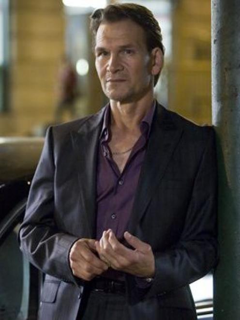 In this image released by A&E, Patrick Swayze is shown in a promotional photo for the A&E series,...