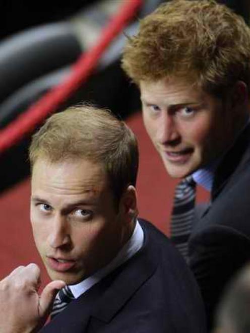 In this June 2010 file photo, Britain's Prince William, left, and Britain's Prince Harry, right,...