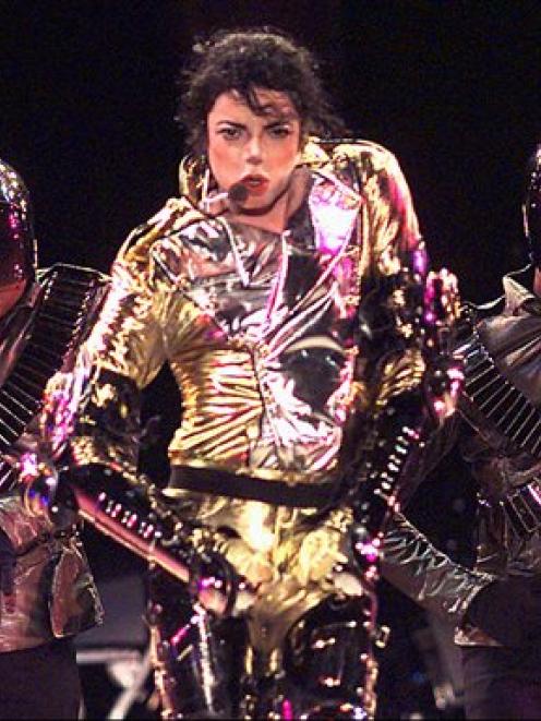 In this November 14, 1996 file photo, Michael Jackson performs in Sydney. Jackson, 50, died in...