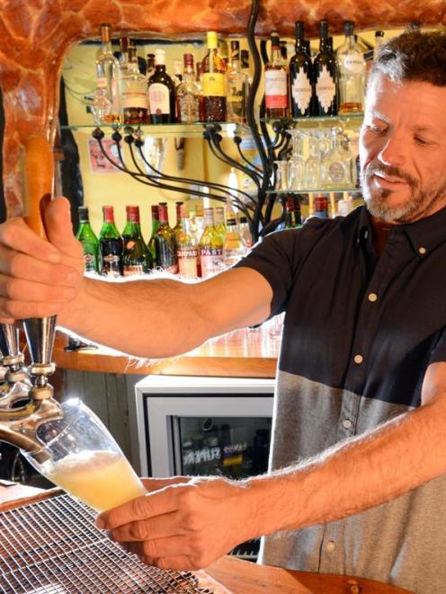 Inch Bar owner Jonas Hjertquist pours a 3.7% low-alcohol beer. From Monday, he will offer a 2.5%...