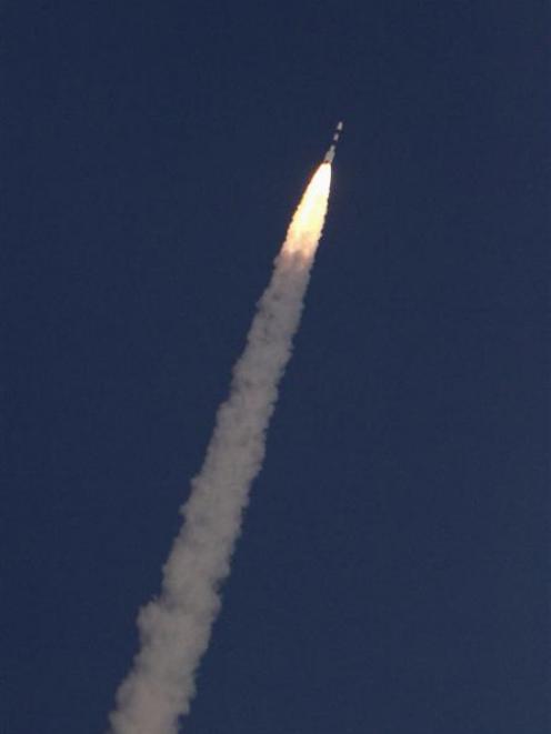 India's Polar Satellite Launch Vehicle, carrying the Mars orbiter, blasts off from the Satish...