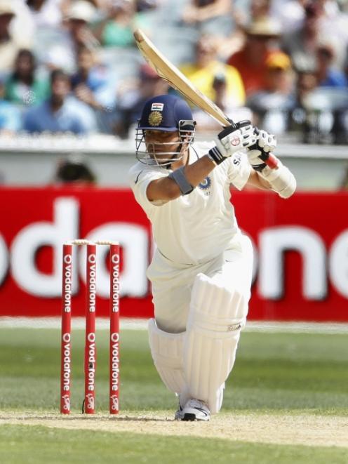India's Sachin Tendulkar on the drive during the first test against Australia in Melbourne....