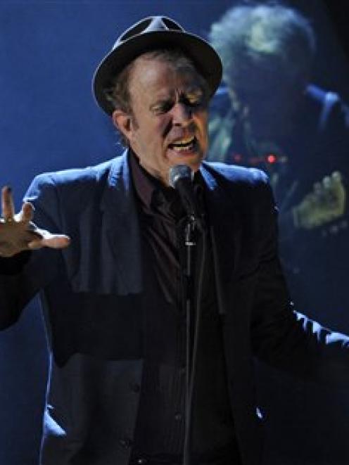 Inductee Tom Waits performs at the Rock and Roll Hall of Fame induction ceremony in New York. (AP...