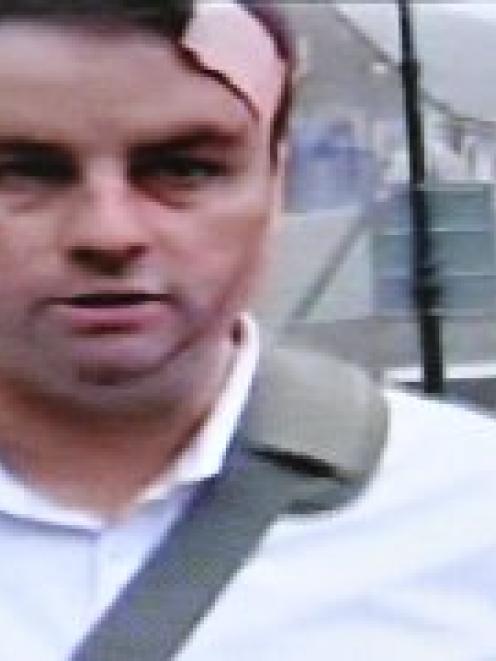 Injured former Otago Daily Times South Otago reporter Glenn Conway leaves Cathedral Square. Photo...