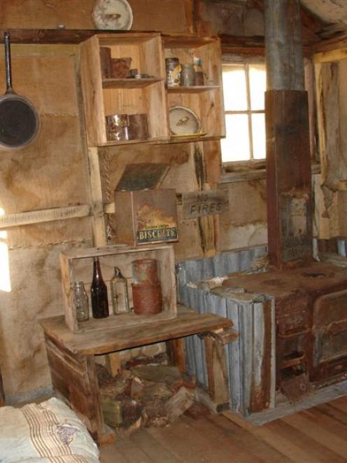 Inside Boozer hut, with the mining artefacts reinstalled by Doc Wakatipu staff. Photos by Richard...
