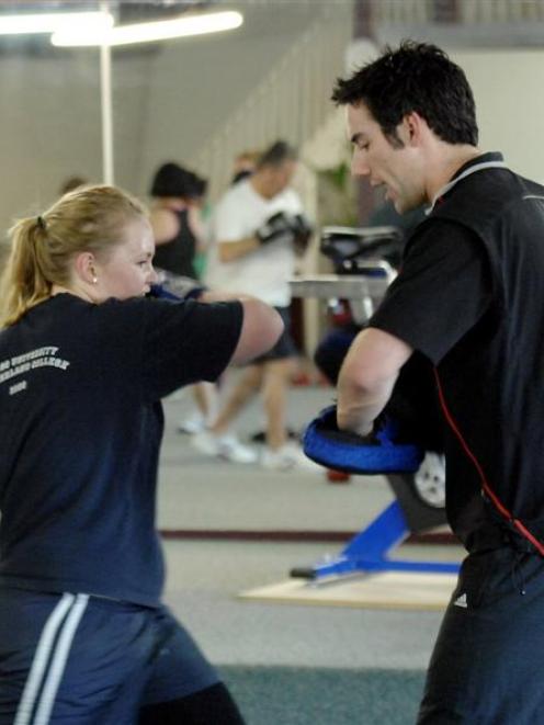Instructor and personal trainer Richard McKinlay and Freiya Campbell go through the moves.