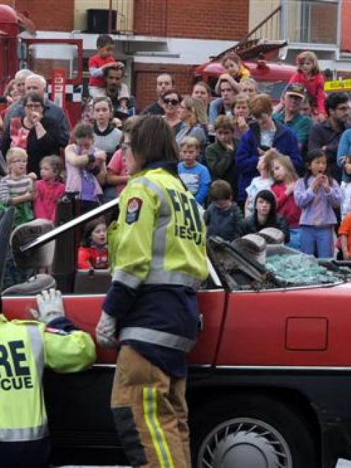 Interested spectators of all ages watch a firefighting  display at the Dunedin Central Fire...