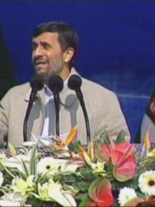 Iranian President Mahmoud Ahmadinejad speaks at a rally in Tehran marking the 31st anniversary of...