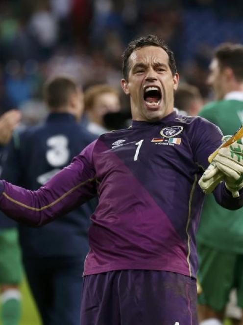 Ireland's David Forde celebrates after their Euro 2016 Group D qualification soccer match against...